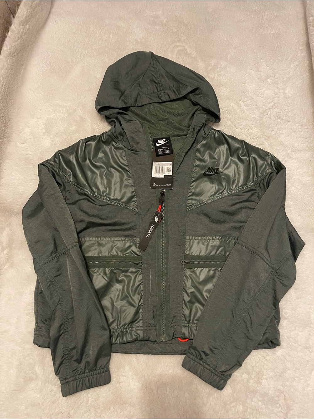 Nike WOMENS Hooded Windbreaker Jacket in Dark Olive Green